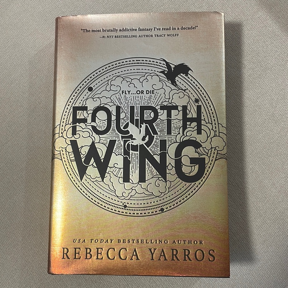 Fourth Wing Book with sprayed edges and first edition.